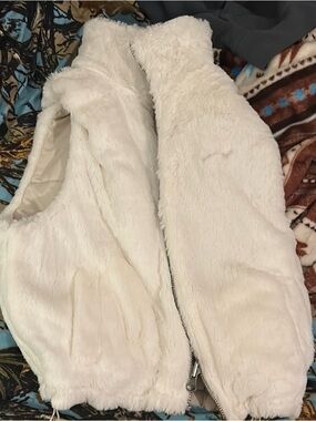 Cozy Ivory Faux Fur Zip Vest it is reversible!